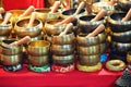 Bunch of piled Hinduist tibetan singing bowls for wellness practices