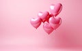 Bunch of pink reflective heart shaped balloons tied together isolated on pink background. Royalty Free Stock Photo