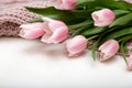 Bunch of pink tulip flowers on white background, spring flowers banner