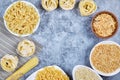 A bunch of raw pasta bowls on blue background