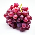 A bunch of red grapes on a white surface Royalty Free Stock Photo