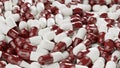 Bunch of Red white capsule pills on a white background - Medicine healthcare medicaments