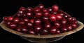 A bunch of ripe cherries lie on a plate, isolated on black. Ripe red berries, ripe fruits. Lots of burgundy cherries on a dark Royalty Free Stock Photo