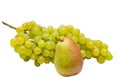 Bunch of ripe green grapes and a juicy pear isolated on white background Royalty Free Stock Photo