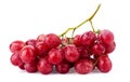 Bunch of ripe red grapes with leaves isolated on white Royalty Free Stock Photo