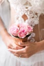 Bunch of roses in brides gentle hands