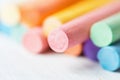 Bunch Row of Multicolored Chalks Crayons on White Background. Education Arts Crafts Creativity Concept.