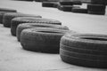 a bunch of rubber tires for cars. enclosing territory