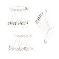 Bunch of safety pins isolated on white background, set of different foreshortenings Royalty Free Stock Photo