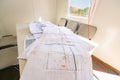 Bunch of scattered architectural blueprints, plans, drawings in office Royalty Free Stock Photo