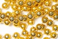 Bunch shiny golden color fake jewel round beads threads macro