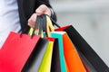 Bunch of shopping bags in male hands outdoor, close up. Plan your purchases in advance. Shopping tips. Successful Royalty Free Stock Photo