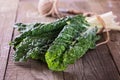 Bunch of silverbeet on a rustic wooden background close up