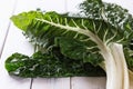 Bunch of silverbeet on a rustic wooden background