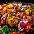 A bunch of skewers of meat and vegetables on a grill