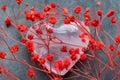 Bunch of Small Red Delicate Flowers Heart Shape Pink Quartz Crystal Sugar Candy Sprinkles on Grey Background. Romantic Valentines