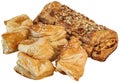 Bunch Of Small Square Sesame Puff Pastry Zu-Zu And Integral Bread Loaf With Sunflower Seeds Isolated On White Background