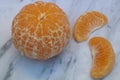 a bunch and some peeled oranges