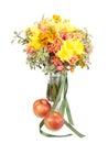 Bunch of spring flowers in a vase with apple isolated on white b Royalty Free Stock Photo