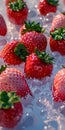 A bunch of strawberries in a bowl of water