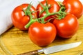 Bunch tomatoes on a cutting board Royalty Free Stock Photo