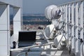 Bunch of transmitters and aerials on the skyscraper