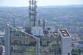 Bunch of transmitters and aerials on the skyscraper