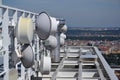 Bunch of transmitters and aerials on the skyscraper