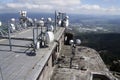 Bunch of transmitters and aerials on telecommunication tower