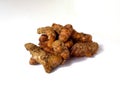 Bunch of turmeric over white background. Southeast Asian spices. Curcuma longa.