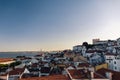 Aerial view of portuguese orange roofs and houses along the sea at sunset in the southern europe, Porto, Portugal Royalty Free Stock Photo