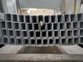 A bunch u shape electro galvanized stacked together in manufacturing factory.