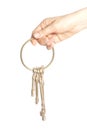 Bunch of vintage keys holding hand Royalty Free Stock Photo