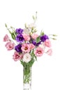 Bunch of violet, white and pink eustoma flowers in glass vase Royalty Free Stock Photo