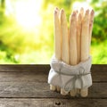 Bunch of white asparagus on rustic wood_001