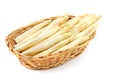 Bunch of white asparagus vegetables in wooden basket