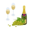 Bunch of white grapes and a bottle of sparkling wine and two glasses full of bubbly champagn