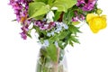 Bunch of wild flowers in glass vase Royalty Free Stock Photo