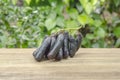 bunch of witch finger grapes on wooden floor Royalty Free Stock Photo