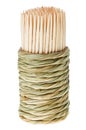 Bunch of wooden toothpick in round straw holder