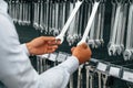 Bunch of wrenches. Man is in the hardware shop Royalty Free Stock Photo