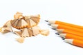 Bunch of yellow pencils with shawings and pencil sharpeners isolated on white - Image Royalty Free Stock Photo