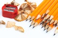 Bunch of yellow pencils with shawings and pencil sharpeners isolated on white- Image