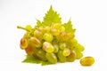 A bunch of yellow and pink grapes with a green leaf close-up isolated on a white background Royalty Free Stock Photo