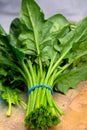 Bunch of young fresh leaves of green organic spinach ready to cook Royalty Free Stock Photo