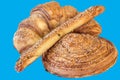 Bunch of Zuzu Square Puff Croissant Pastry Isolated on Blue Background