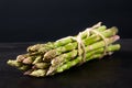 Bunched uncooked asparagus Royalty Free Stock Photo