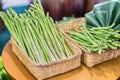 Bunches of asparagus on a wood background. Royalty Free Stock Photo