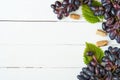 Bunches Black grapes on a light table