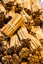 Bunches of cinnamon sticks in a herbal shop Royalty Free Stock Photo